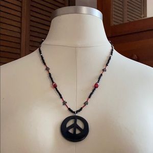 Handmade black and red beaded peace necklace